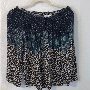 Slight off the shoulder patterned top